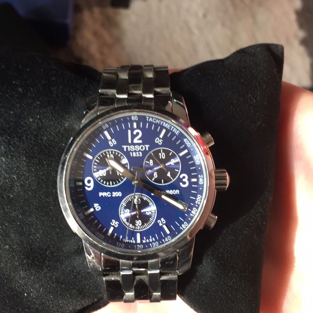 blue face tissot watch